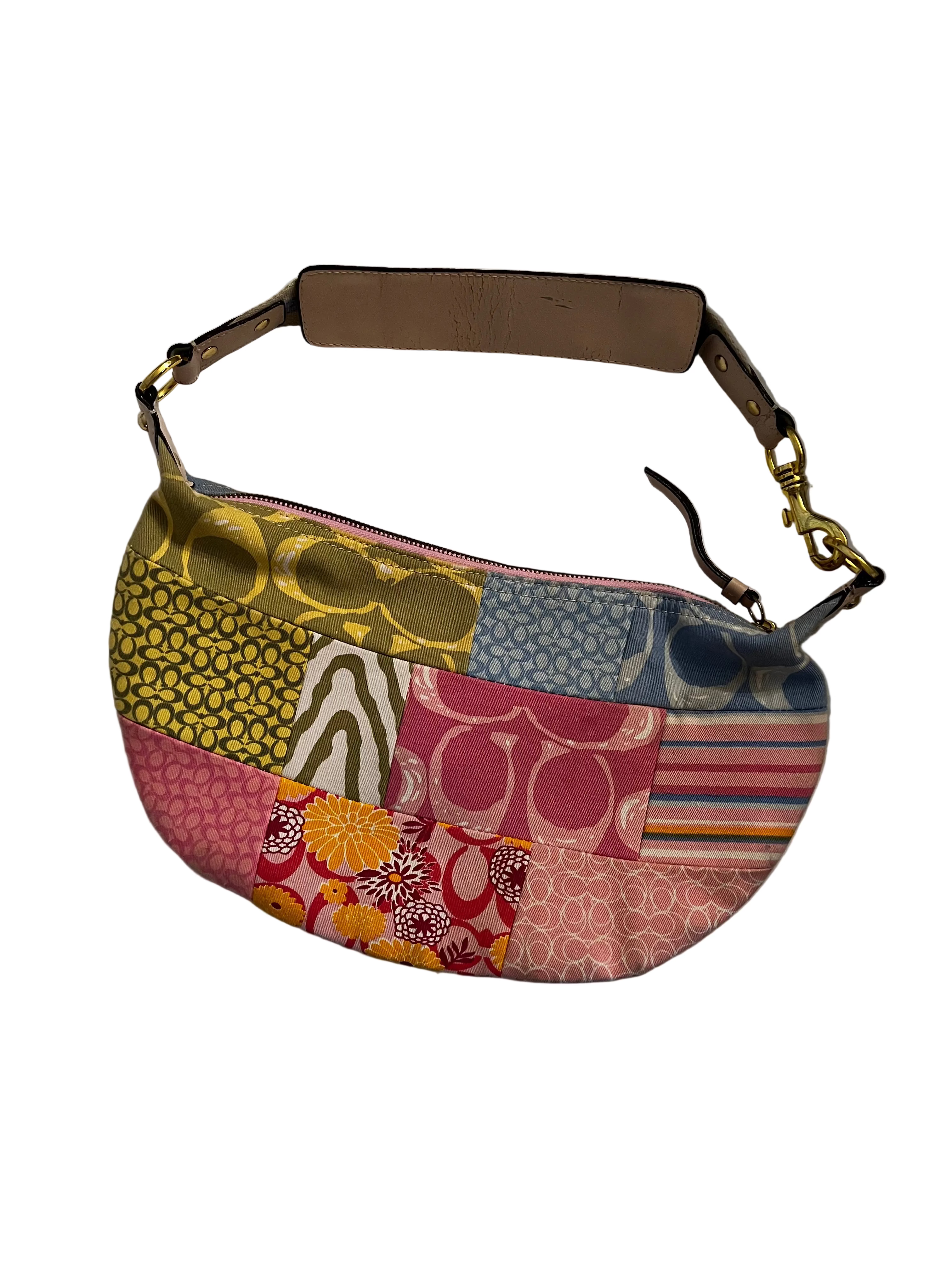 Multicolored patchwork handbag on a white surface